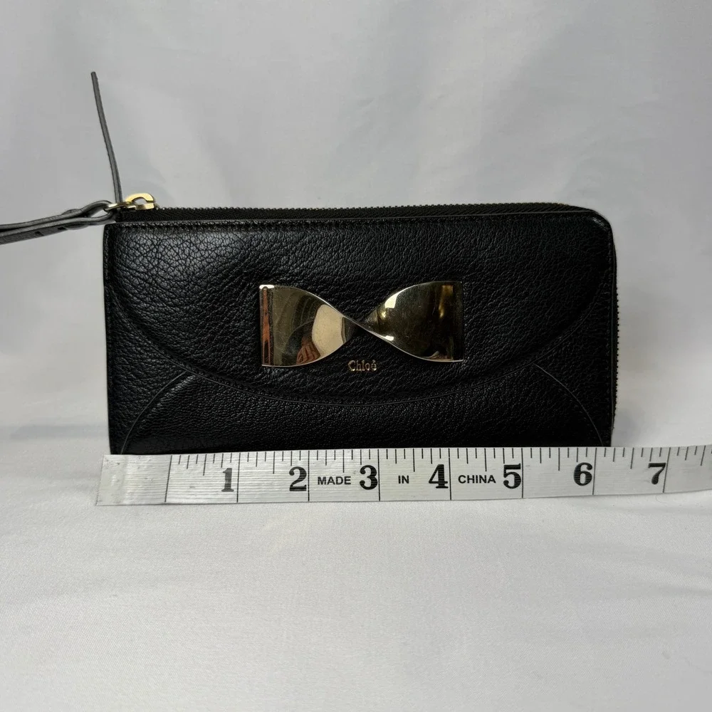 Chloe Twisted Bow Zip Around Wallet Womens Long Black Pebbled Leather Gold